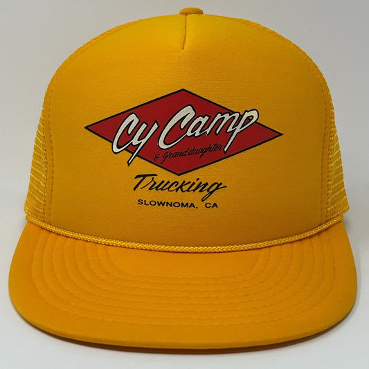Vintage yellow Trucker Hat featuring Cy Camp Trucking logo on the front with mesh backing