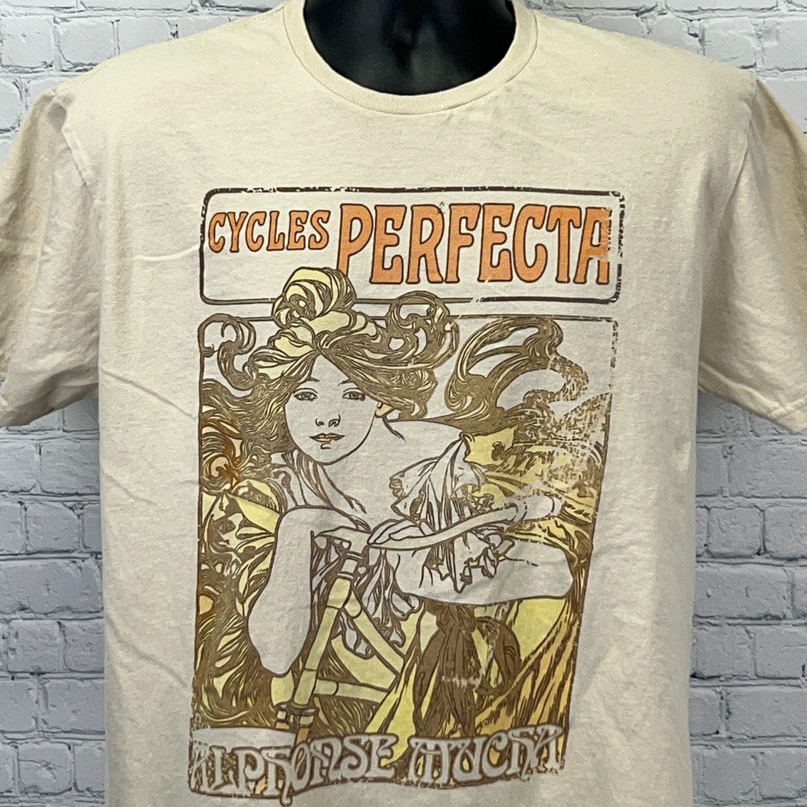 Cycles Perfecta T-shirt in cream featuring a detailed graphic design and unique retro style