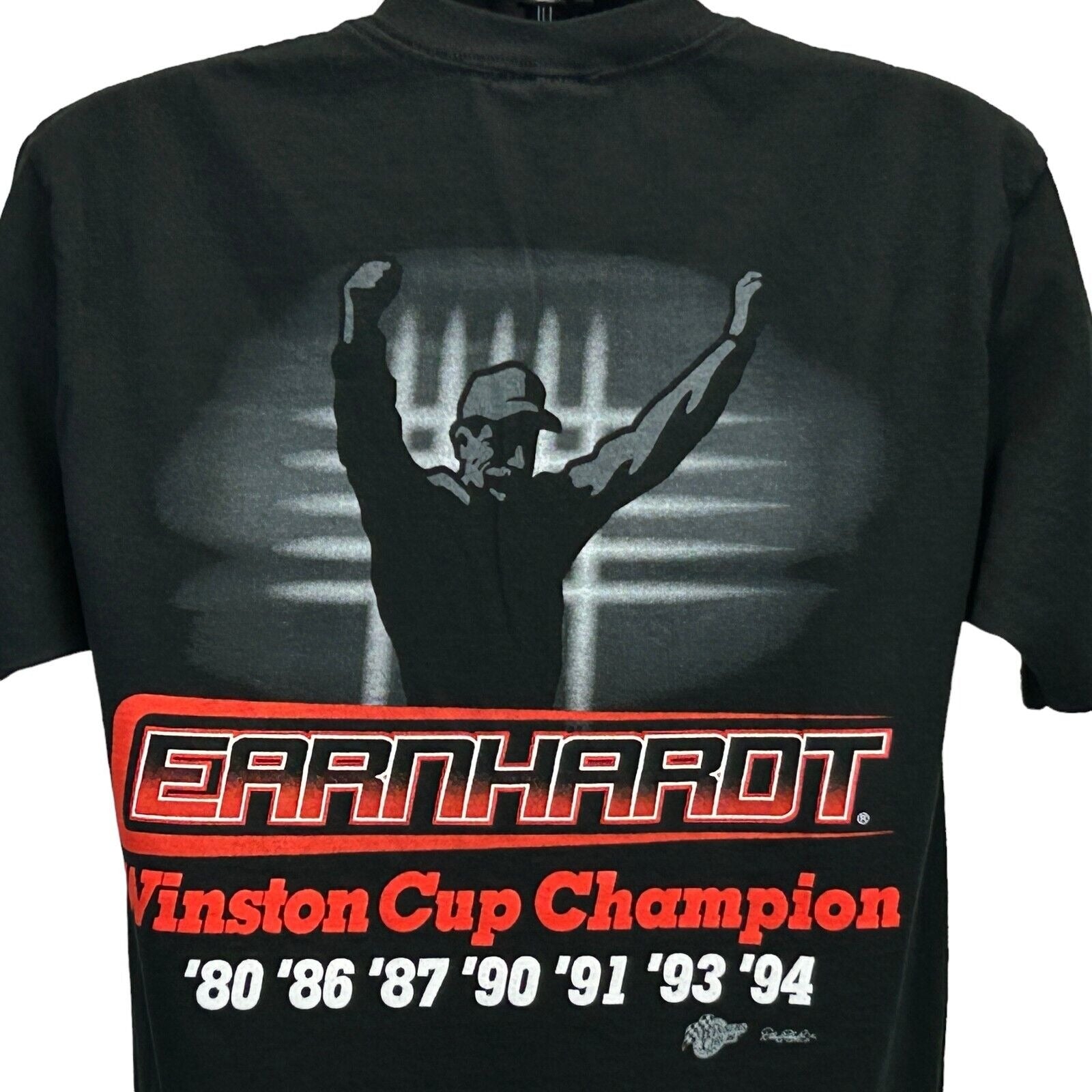 Black Winner's Circle T-Shirt featuring Dale Earnhardt with Winston Cup Champion graphics on the back