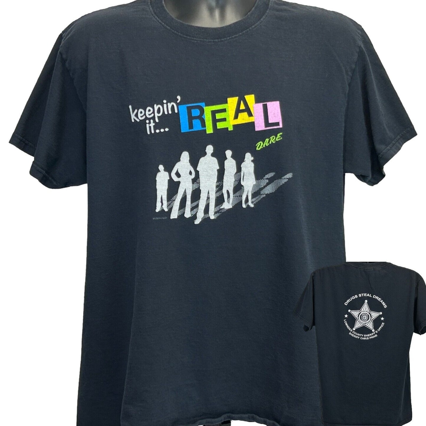 Black Fruit of the Loom T-Shirt in size medium featuring 'keepin' it REAL DARE' graphic on the front