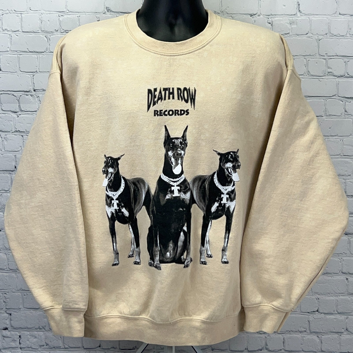 Beige Death Row Records sweatshirt featuring three dogs graphic on the front