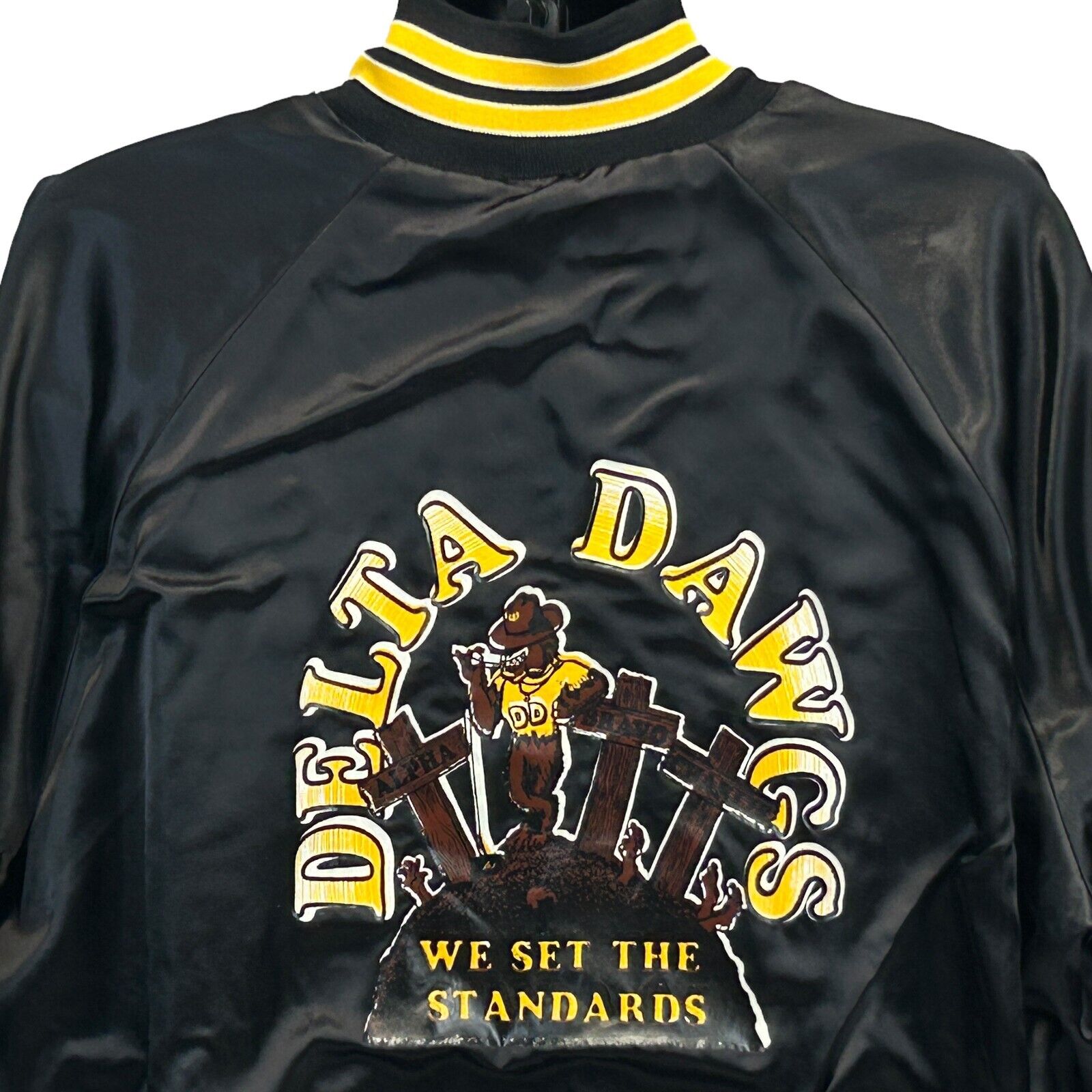 Black Hartwell Delta Dawgs Company Jacket featuring yellow and white logo on front with unique details