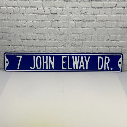 Denver Broncos street sign with blue background and white lettering for John Elway Drive