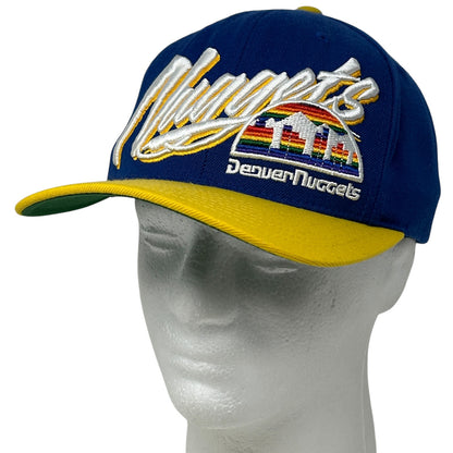 Front view of Mitchell & Ness Denver Nuggets blue and yellow hat featuring embroidered logo and colorful design