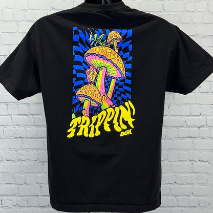 Black DGK T-shirt featuring vibrant mushroom graphic and 'Trippin' text on back