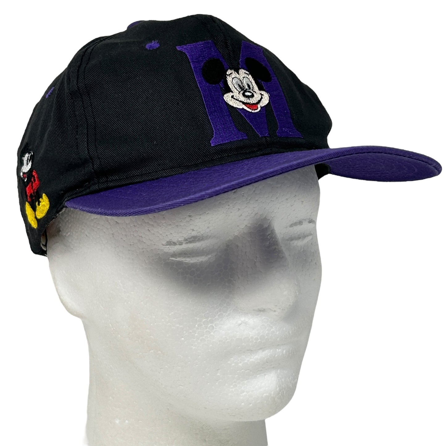 Vintage black Mickey Mouse hat with purple M logo and side character detail for casual wear