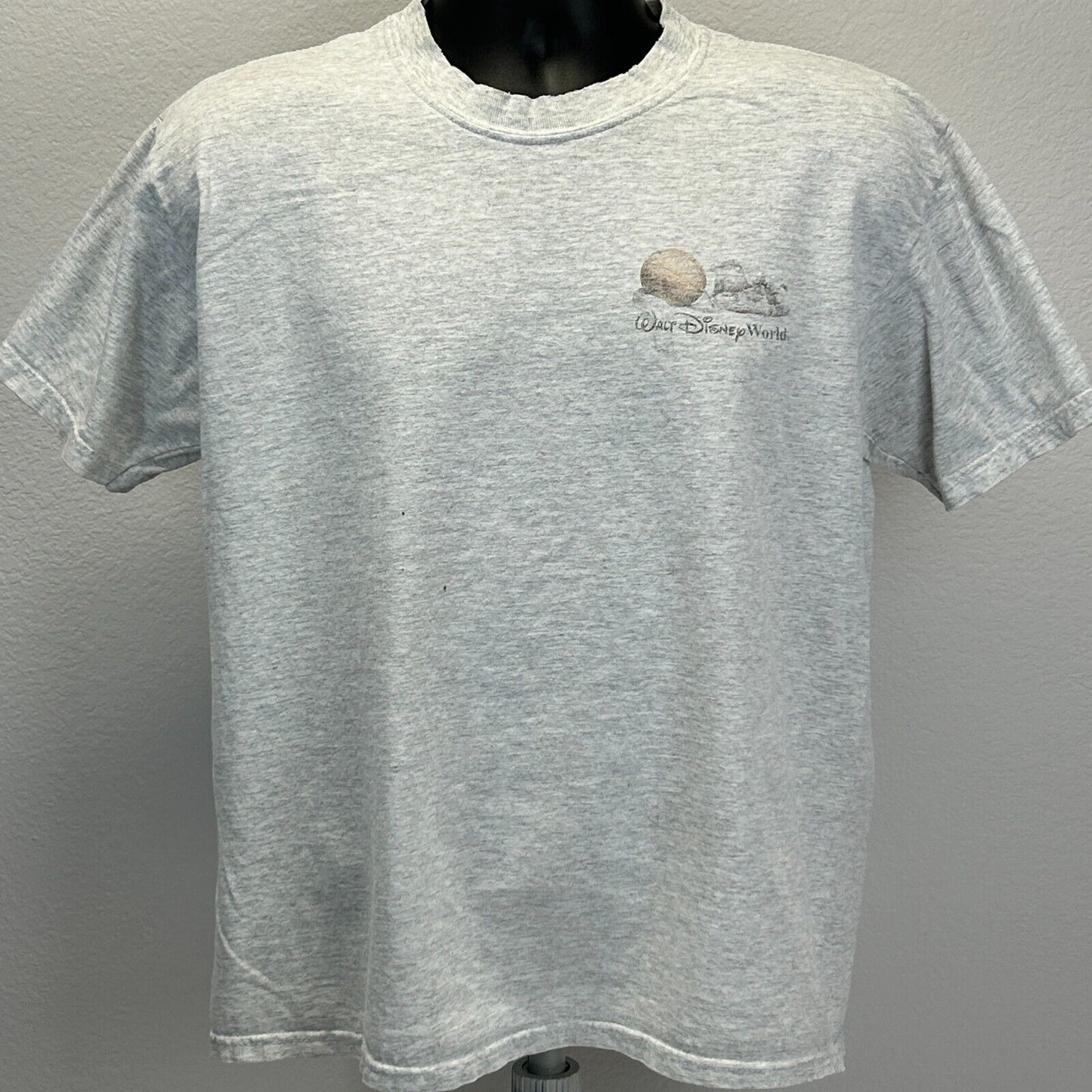 Gray Walt Disney World T-Shirt in medium size featuring a logo on the front