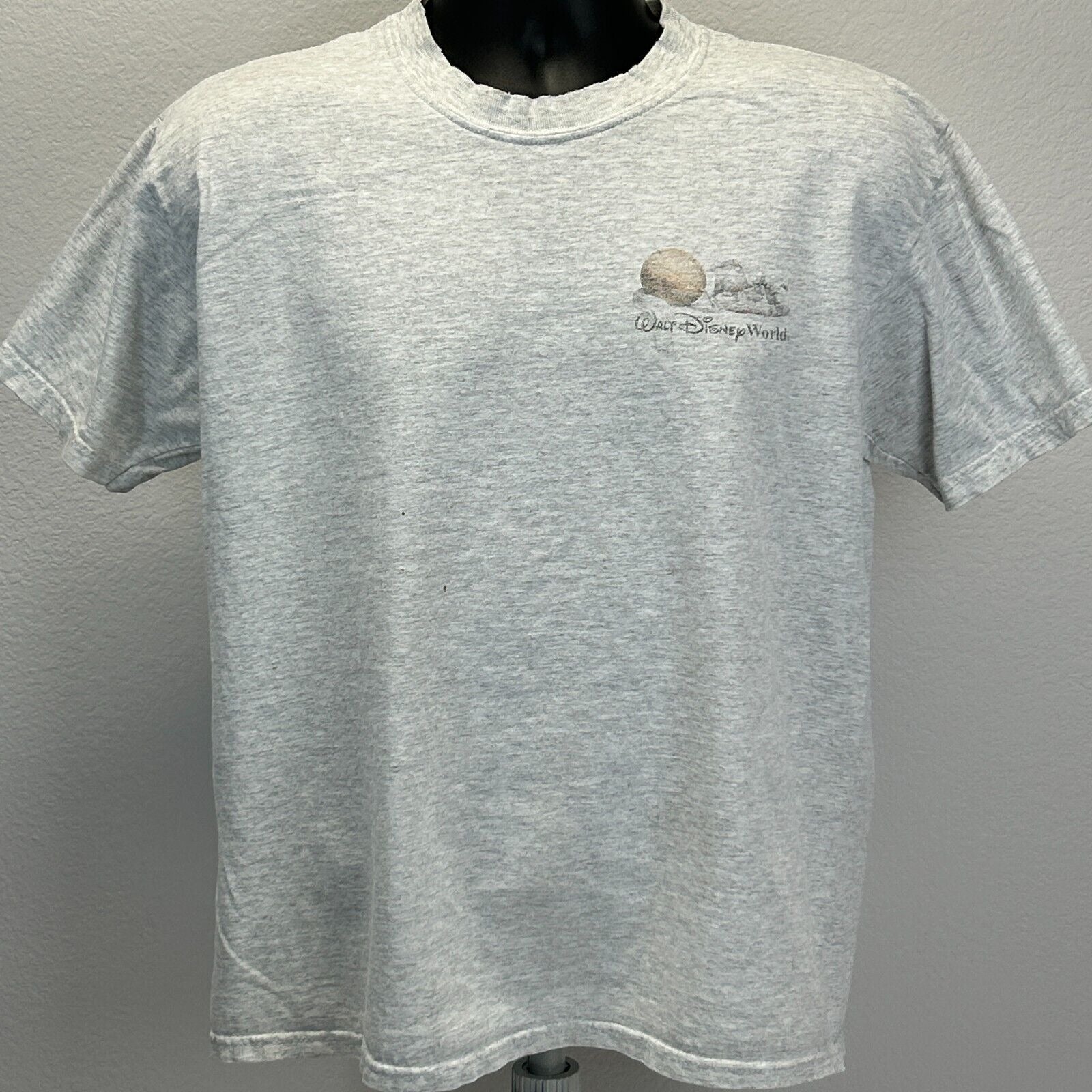 Gray Walt Disney World T-Shirt in medium size featuring a logo on the front