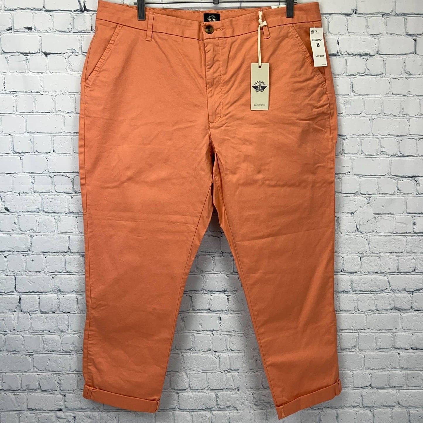 Dockers chino pants in coral color, front view, size not specified