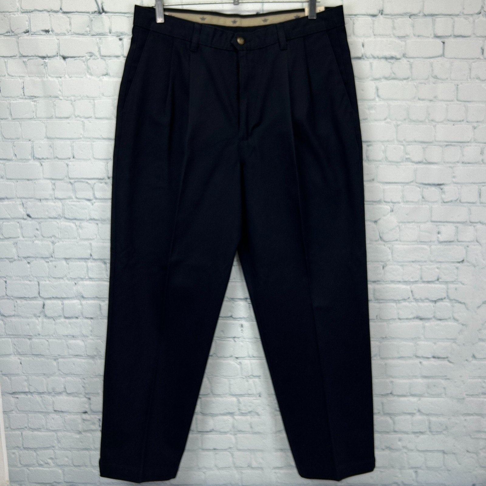 Dockers khaki pants in navy, front view, size 34, timeless style for casual and formal wear.