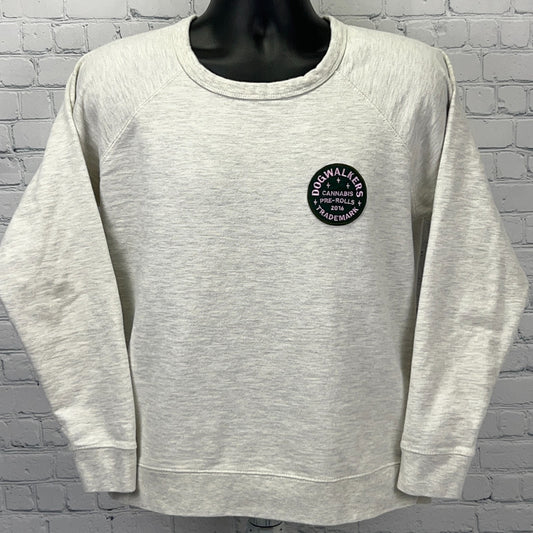 Light gray Dogwalkers Cannabis sweatshirt featuring a round logo on the front for a stylish, relaxed fit