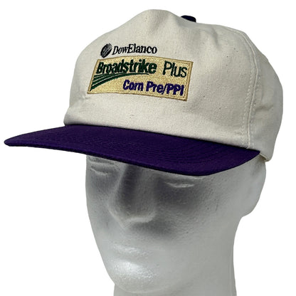 K-Products DowElanco Broadstrike Cap in beige and purple, featuring logo on front with adjustable strap