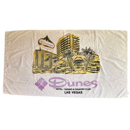 Vintage Dunes Hotel Casino Country Club towel in white with yellow and purple Las Vegas graphic design