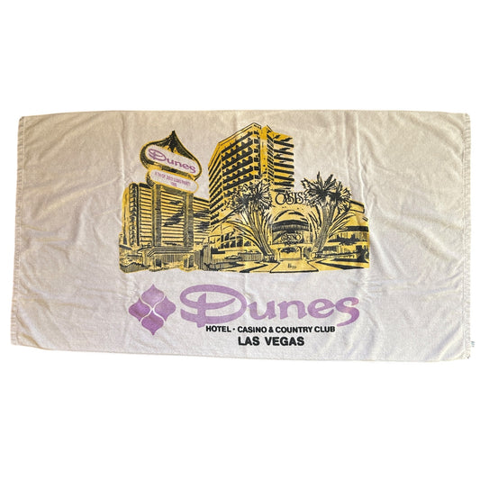 Vintage Dunes Hotel Casino Country Club towel in white with yellow and purple Las Vegas graphic design