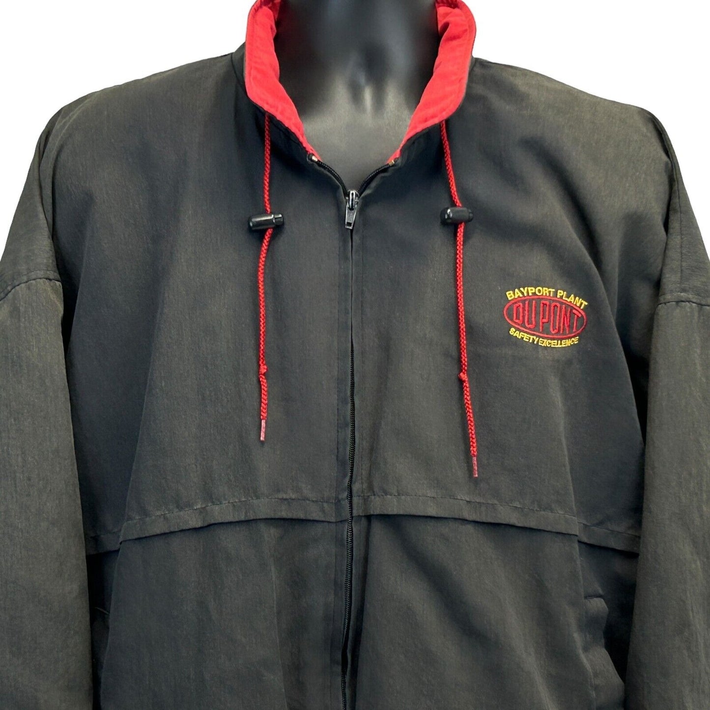 Hilton black jacket with red lining, front view featuring DuPont Bayport Plant logo and adjustable hood