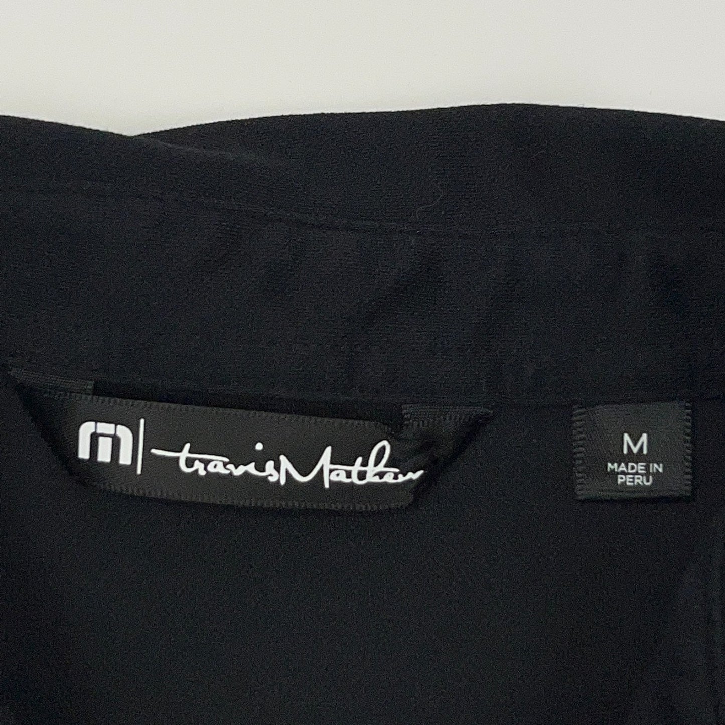 Travis Mathew Oceanside PENTA Polo Shirt Black Short Sleeve Mens M Medium