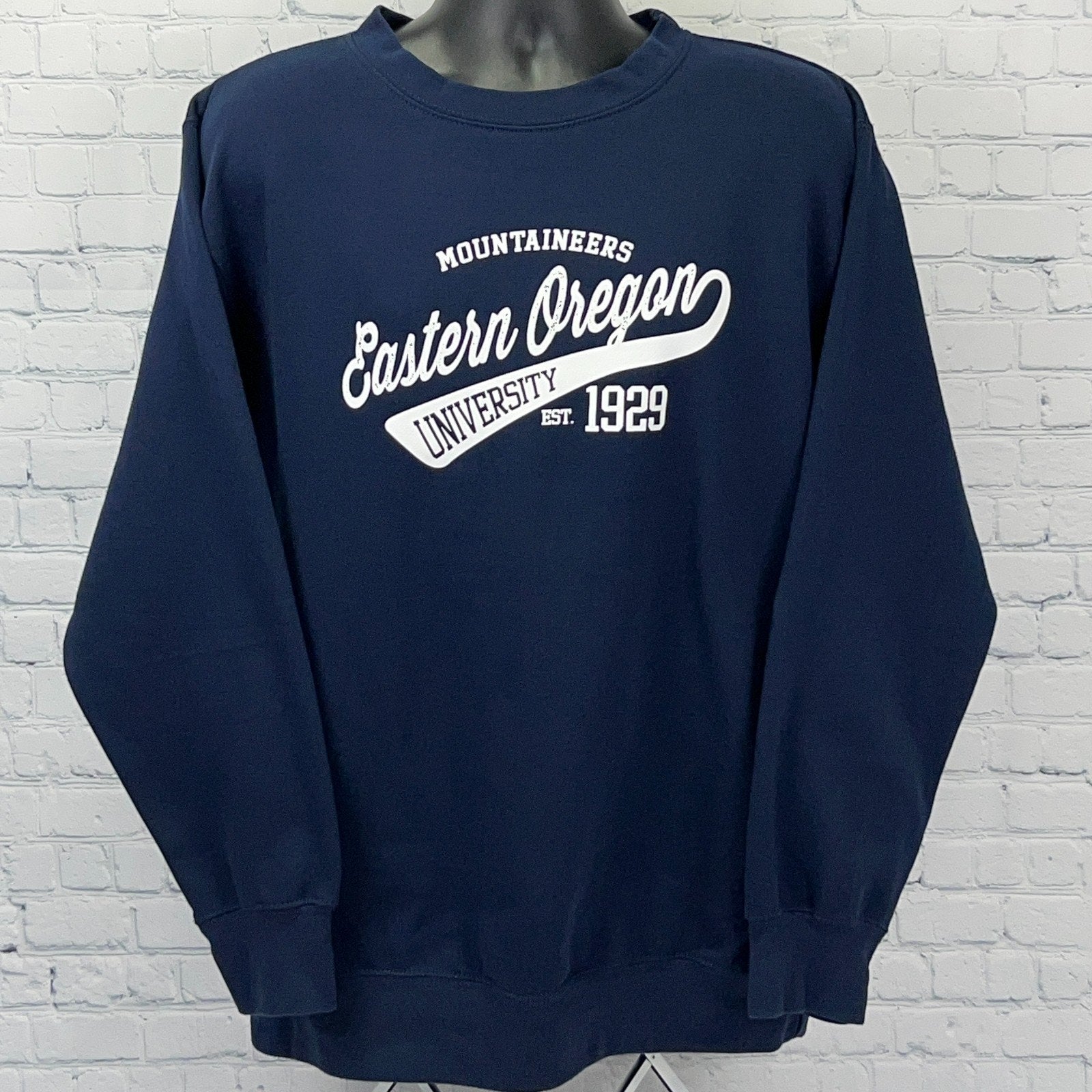 Navy Eastern Oregon University Sweatshirt with Mountaineers logo and established 1929 detail on the front