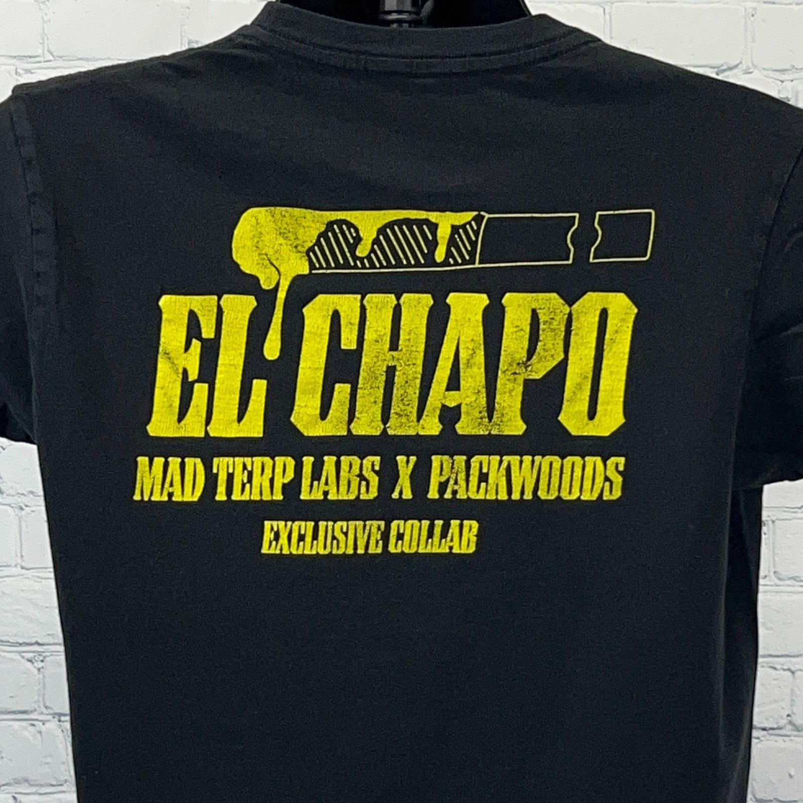 Black t-shirt with yellow El Chapo Mad Terp Labs Packwood graphic on the back