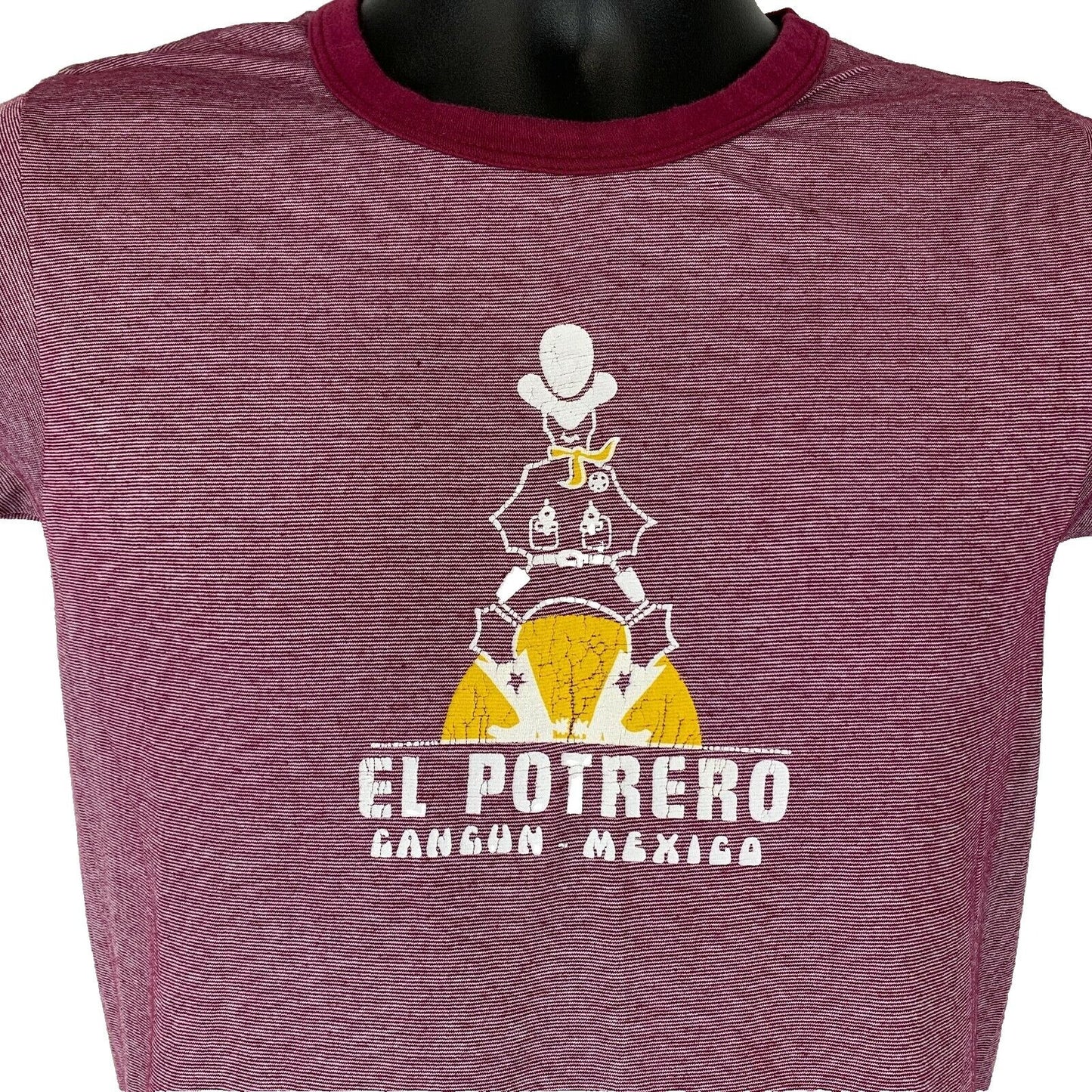 Vintage burgundy Cancun T-shirt with front graphic of a character and logo reading El Potrero