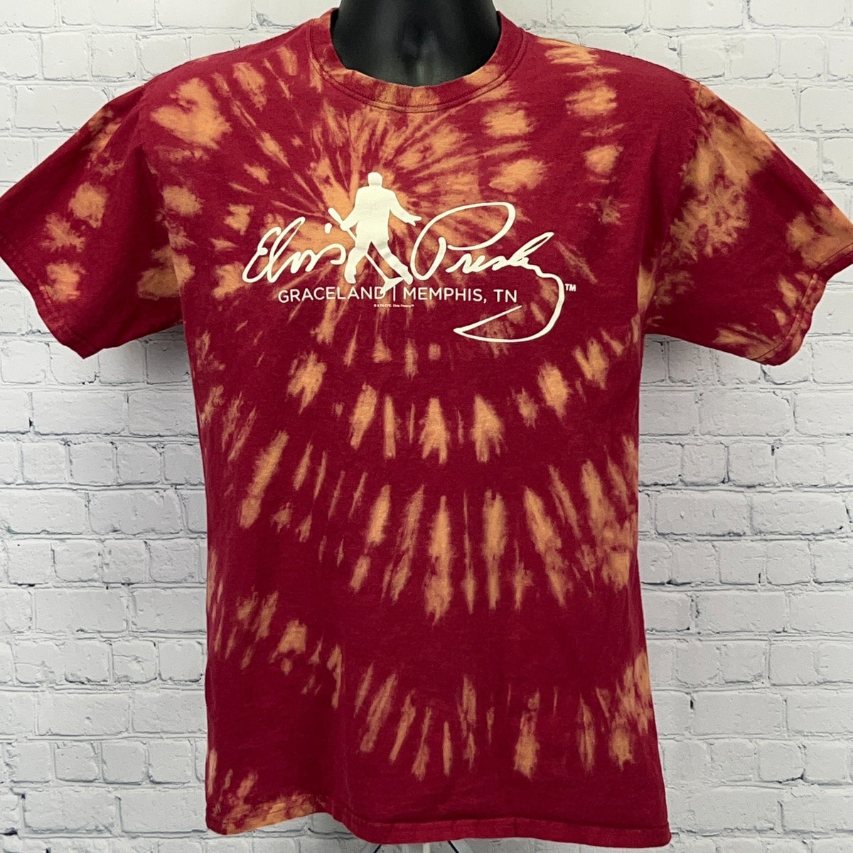 Red and yellow tie-dye t-shirt featuring Elvis Presley logo from Graceland, Memphis, TN, front view.