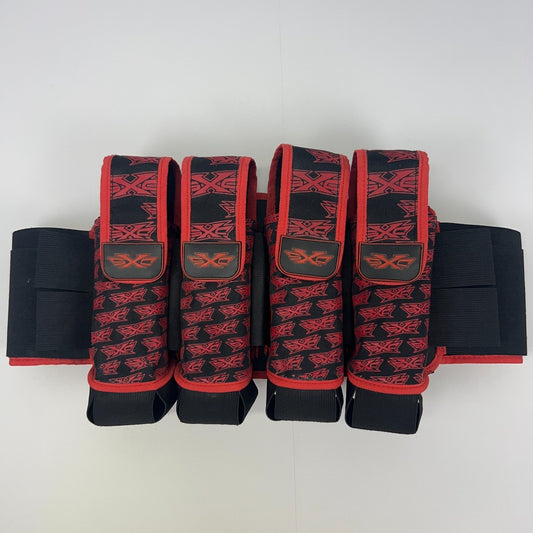 Red and black SXC paintball harness with adjustable straps and logo on the front view