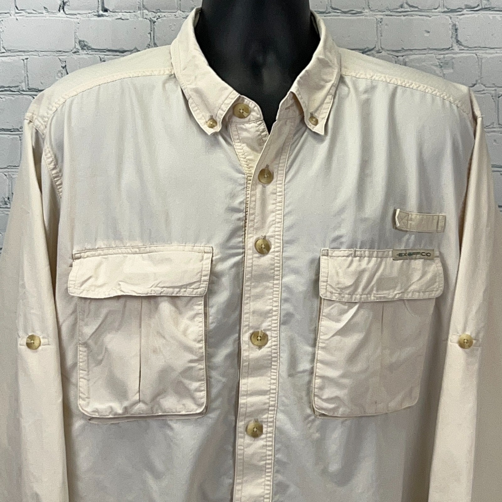 ExOfficio Shirt in beige, front view with two chest pockets and logo detail