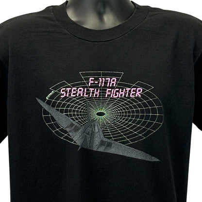 Black Vintage T-Shirt featuring F-117A Stealth Fighter graphic on the front in bright colors