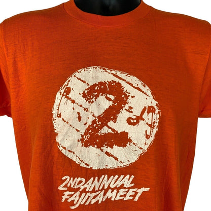 Houston 2nd Annual Fajita Meet T-Shirt in orange with front print design and Screen Stars label