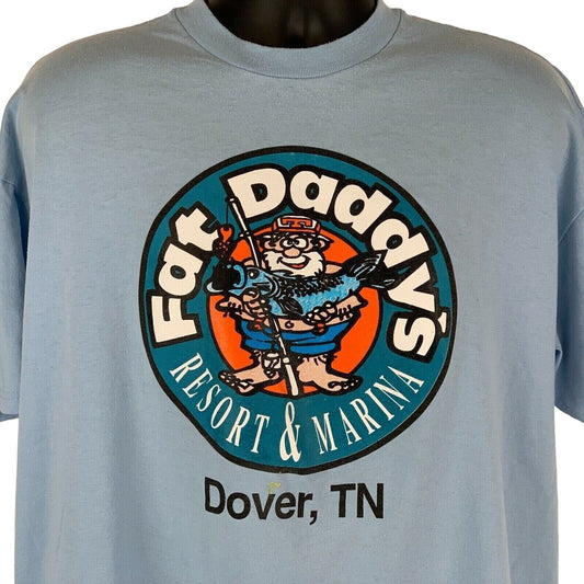 Light blue Hanes T-Shirt featuring Fat Daddys Resort logo on front with fishing design