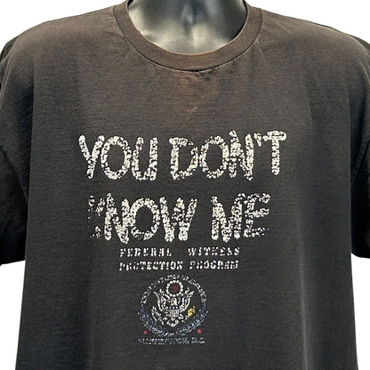 Delta T-Shirt in Black featuring 'You Don't Know Me' text and Witness Protection Program logo in front view