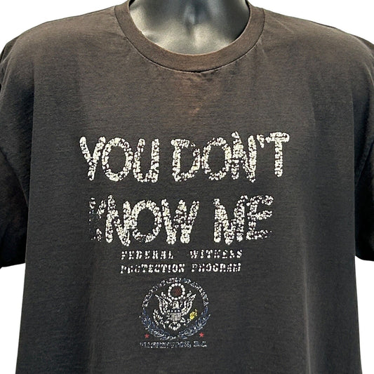 Delta T-Shirt in Black featuring 'You Don't Know Me' text and Witness Protection Program logo in front view
