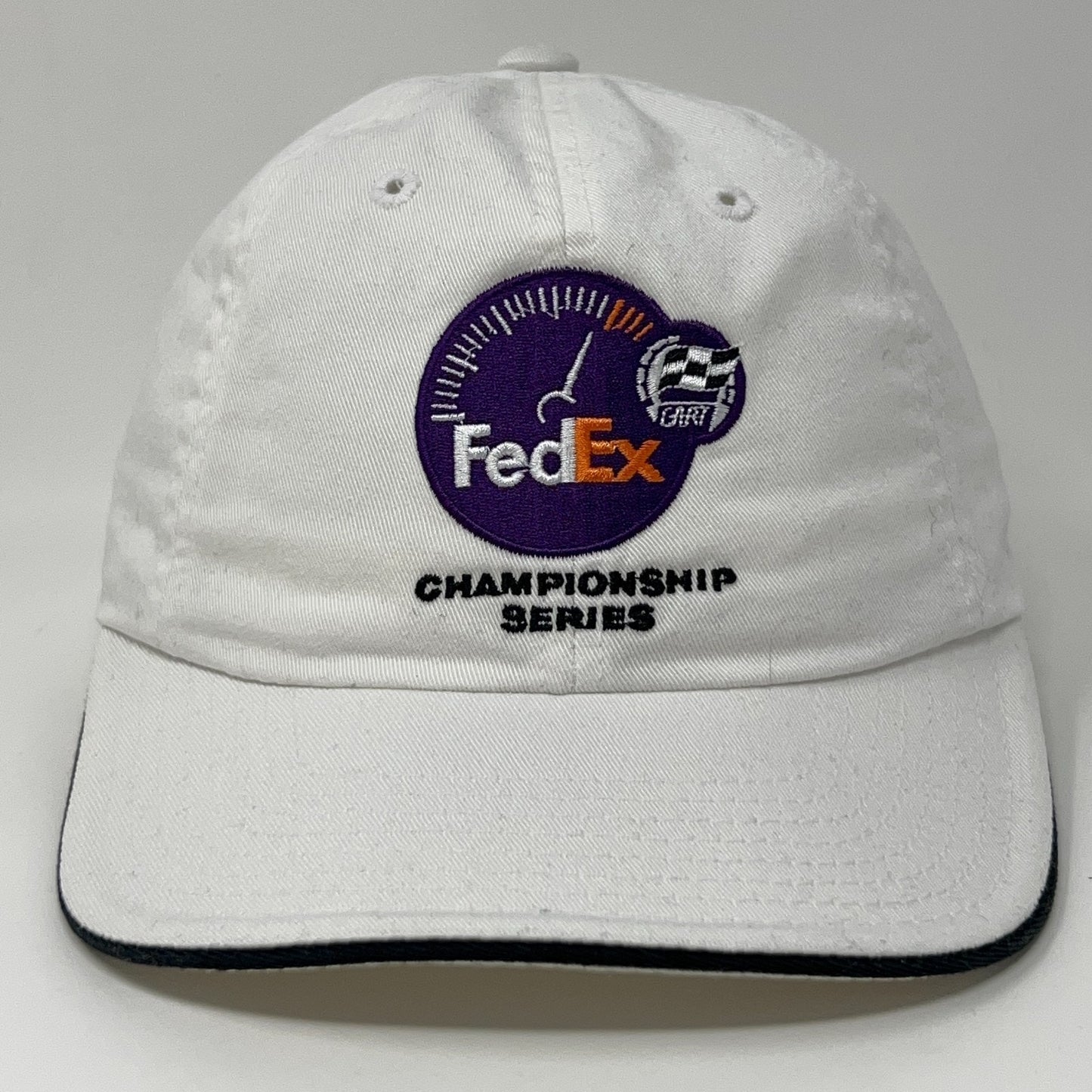 White American Needle Cap featuring embroidered FedEx logo and Championship Series detail on the front.