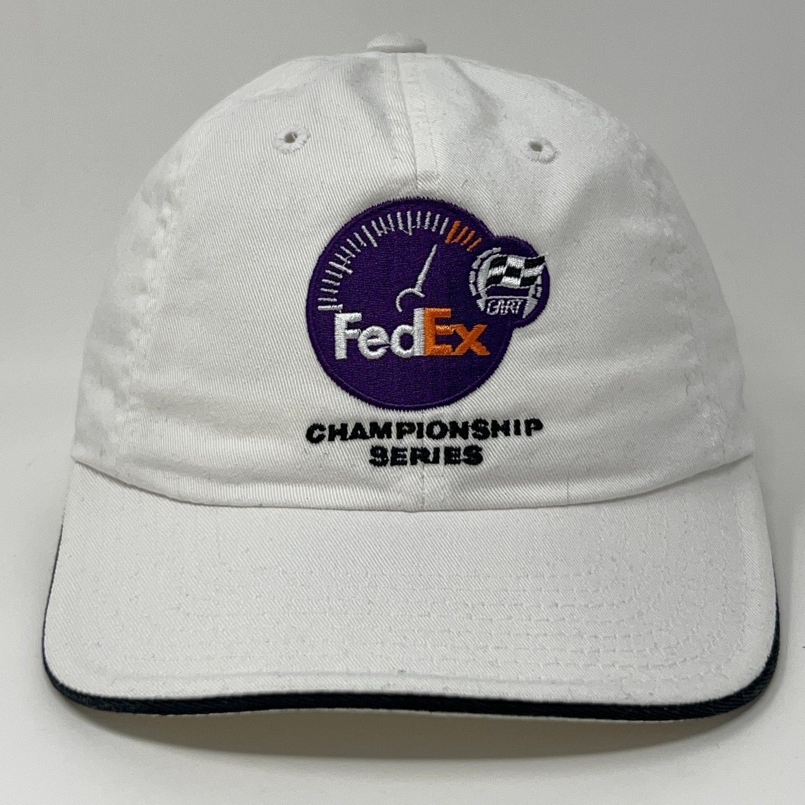 White American Needle Cap featuring embroidered FedEx logo and Championship Series detail on the front.
