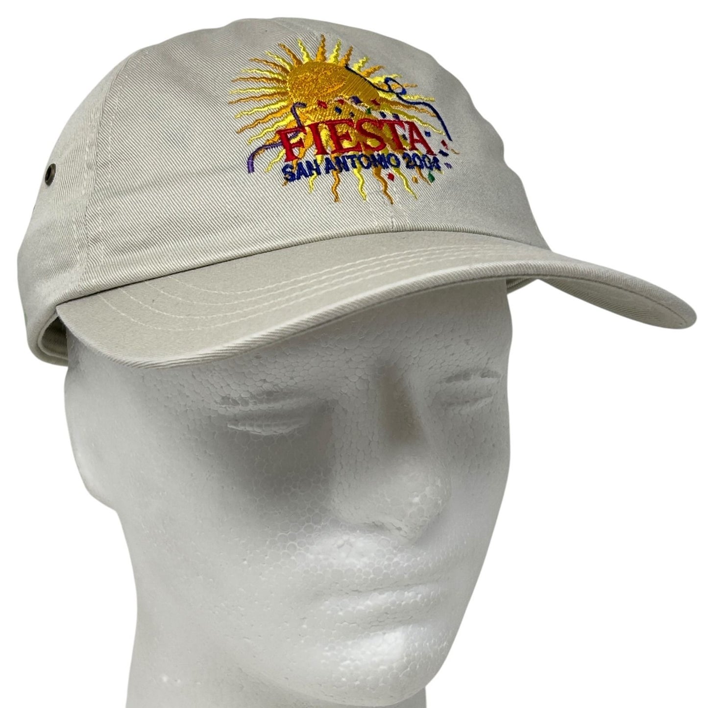 Light tan Texace hat featuring embroidered Fiesta San Antonio design with sun illustration, side view