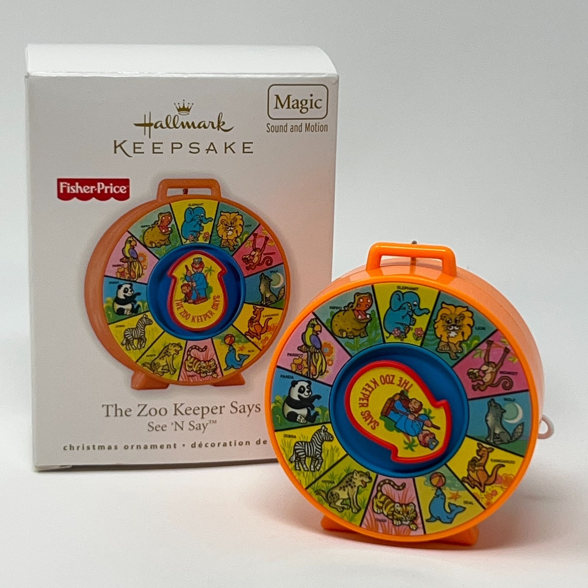 Hallmark Keepsake See N Say Christmas ornament of The Zoo Keeper with vibrant animal illustrations