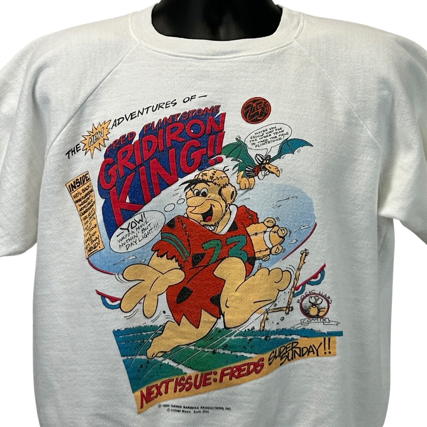Cream Vintage sweatshirt with The Flintstones graphic, featuring Fred Flintstone as Gridiron King, size medium, front view