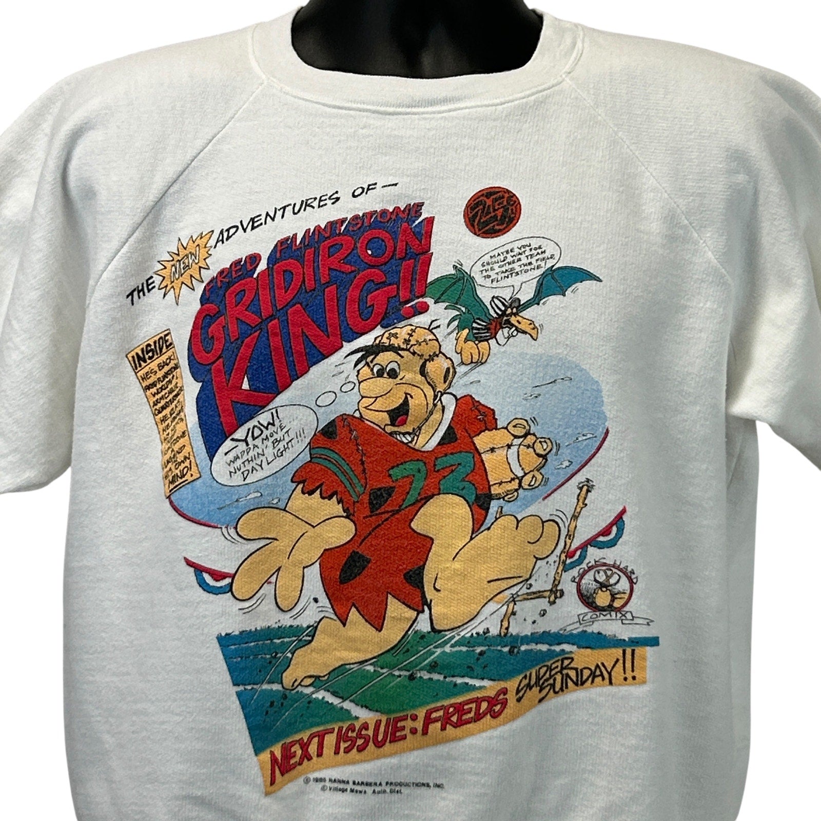 Cream Vintage sweatshirt with The Flintstones graphic, featuring Fred Flintstone as Gridiron King, size medium, front view