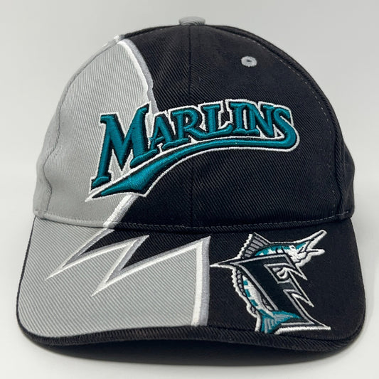 Black Miami Marlins cap with teal logo and grey accents showcasing front view and detailed stitching