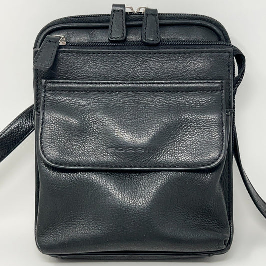Fossil black leather crossbody bag with a front pocket and adjustable strap for convenience