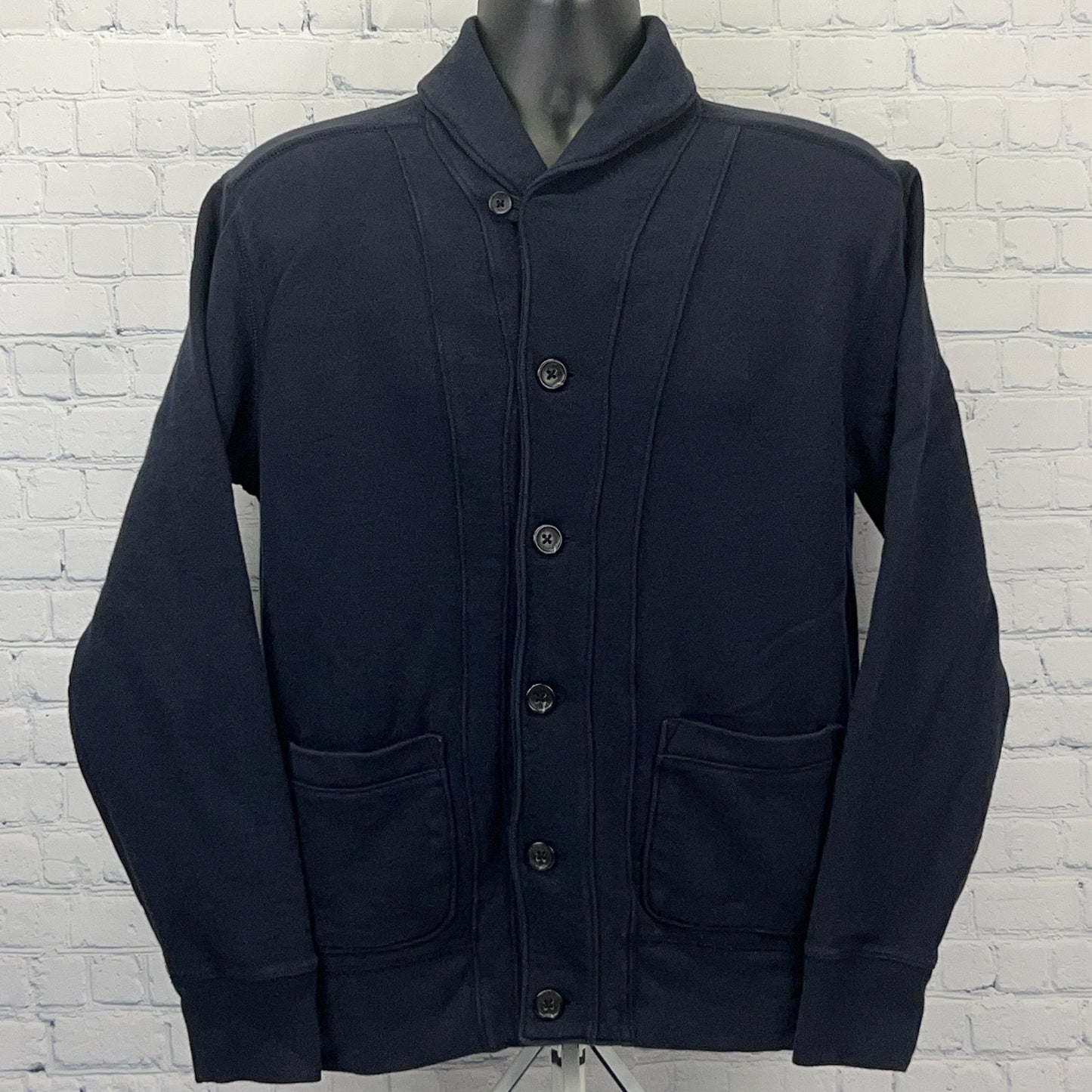Gap navy blue cardigan sweater in size medium, featuring a shawl collar and front pockets with button closure.