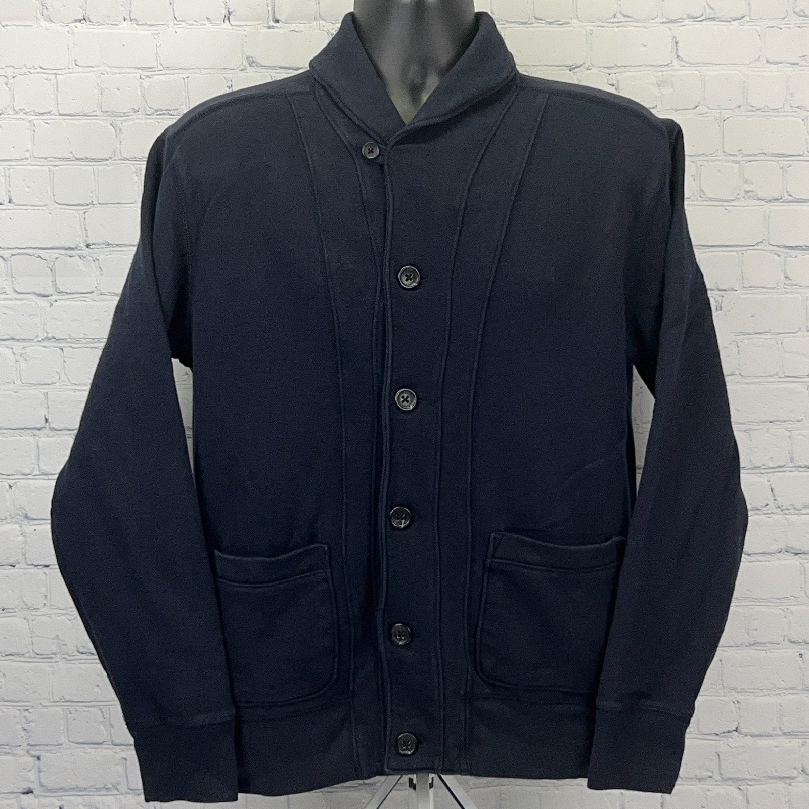 Gap navy blue cardigan sweater in size medium, featuring a shawl collar and front pockets with button closure.