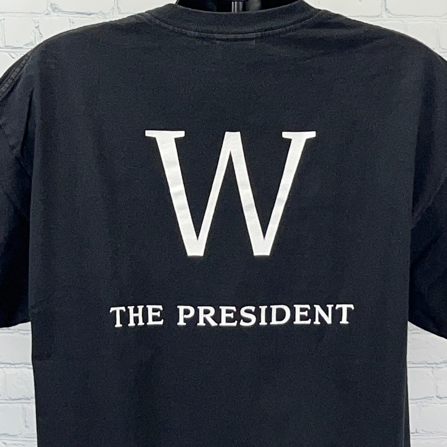 Murina Black T-Shirt featuring large 'W' and 'THE PRESIDENT' text on the back, size medium