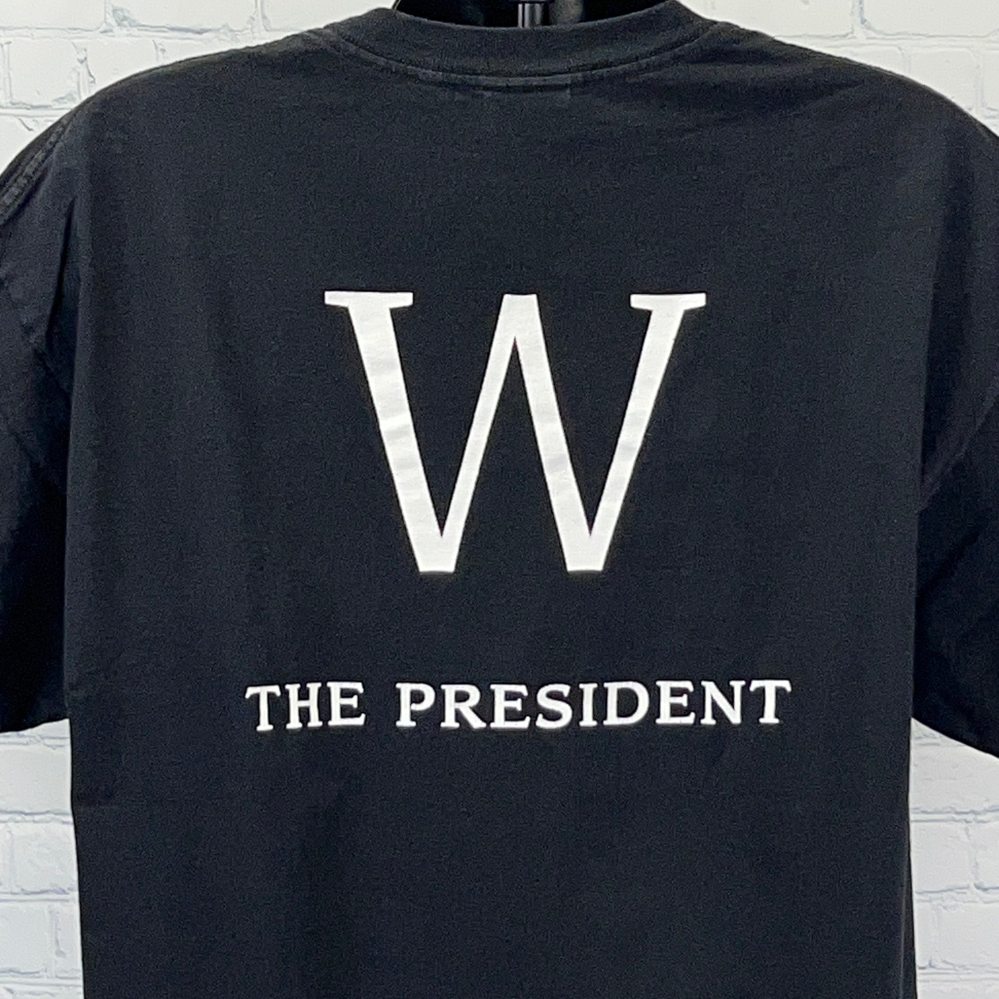 Murina Black T-Shirt featuring large 'W' and 'THE PRESIDENT' text on the back, size medium