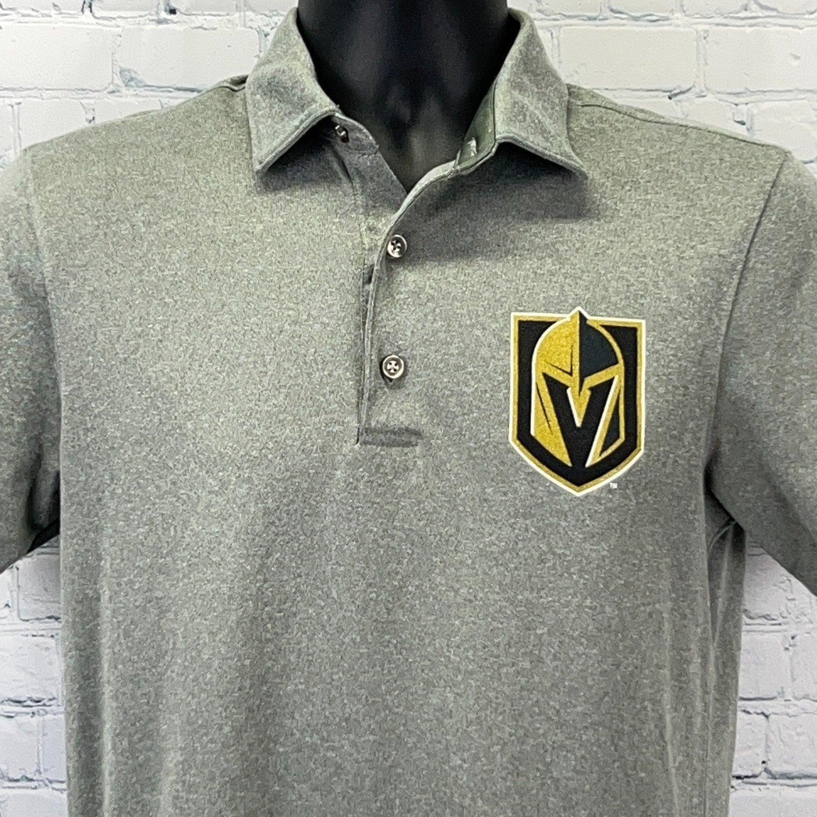 Men's gray polo shirt featuring Golden Knights logo on the left chest, front view