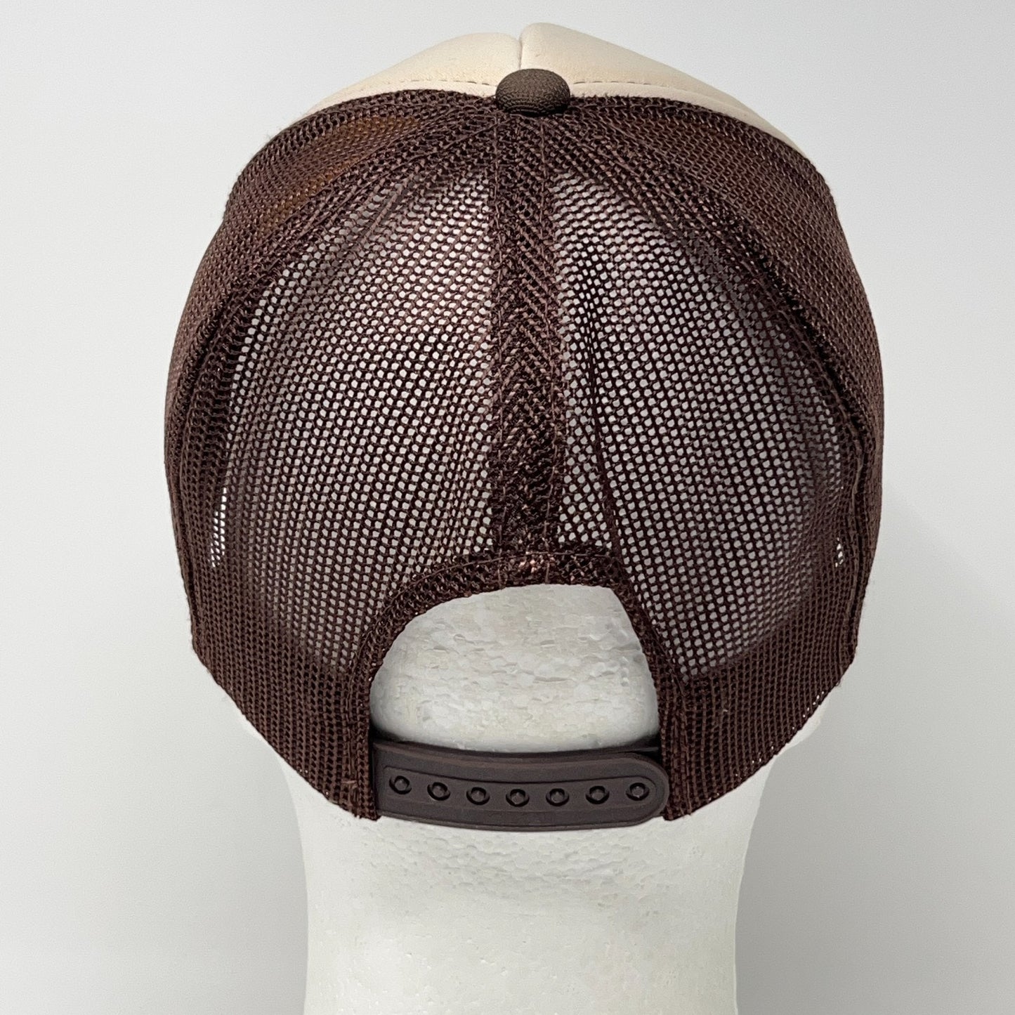 Vintage trucker cap hat in brown with adjustable fit and back view