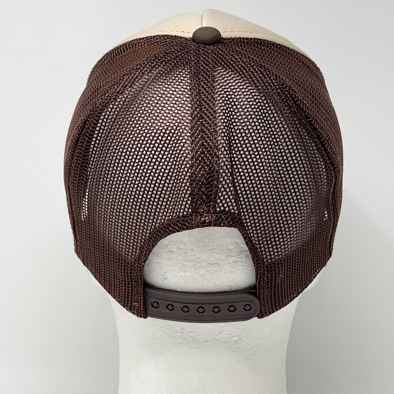 Vintage trucker cap hat in brown with adjustable fit and back view