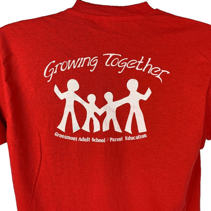 Red Hanes T-Shirt for adults featuring 'Grossmont Adult School' and playful childlike logos on the back