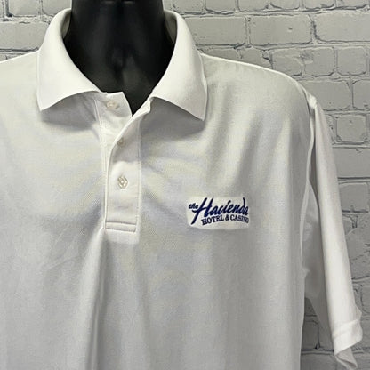 White Vintage Polo Shirt featuring Haciendas Hotel and Casino logo, perfect for Las Vegas fans