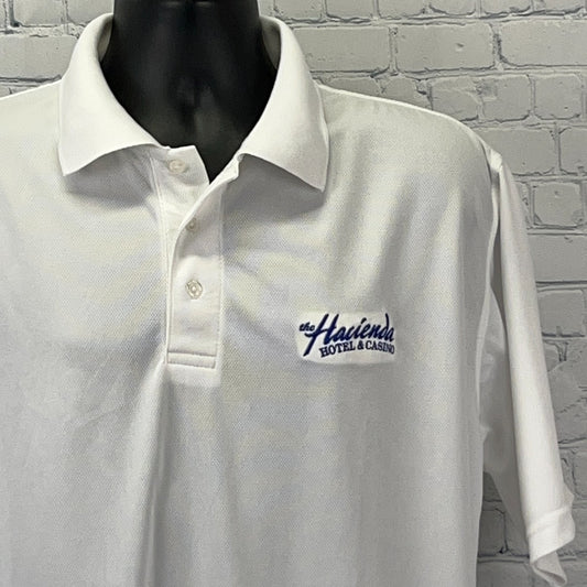 White Vintage Polo Shirt featuring Haciendas Hotel and Casino logo, perfect for Las Vegas fans