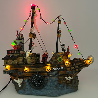 Halloween decorative ship with colorful lights, skeletons, and ghosts, featuring detailed front view and spooky theme